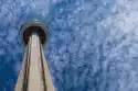 Wally Piekno Dekoracji Fototapeta Na Ścianę Betonowa Wieża Na Tle Chmur Fp 5427